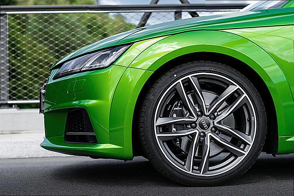 How can I check the tread depth of my tires?